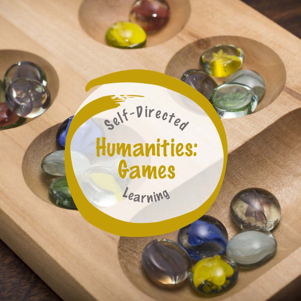 Family Game Night learning — wooden mancala board with colorful glass marbles, highlighting self-directed humanities games.